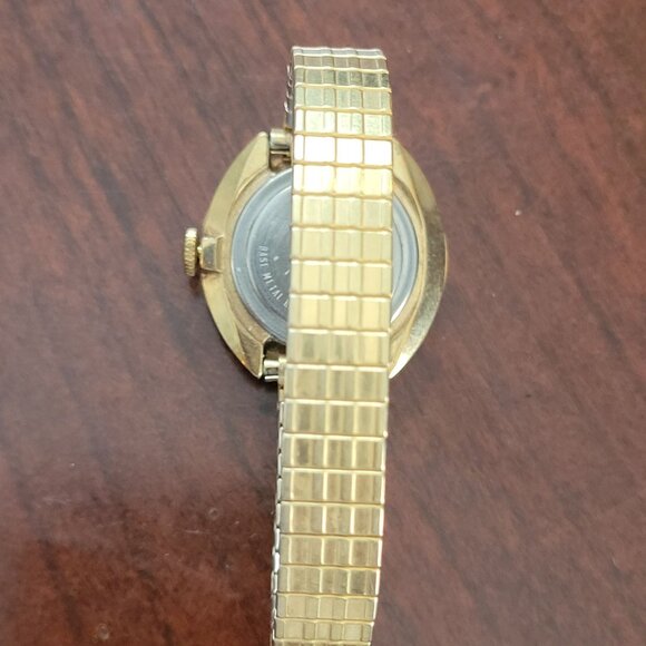 Vintage Timex Womens Gold-Tone Analog Watch With Stretch Band & Round Face - Picture 3 of 4